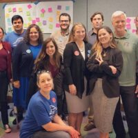 Members of the Unit 19 Bargaining team posing during a session at UC Riverside in 2019.