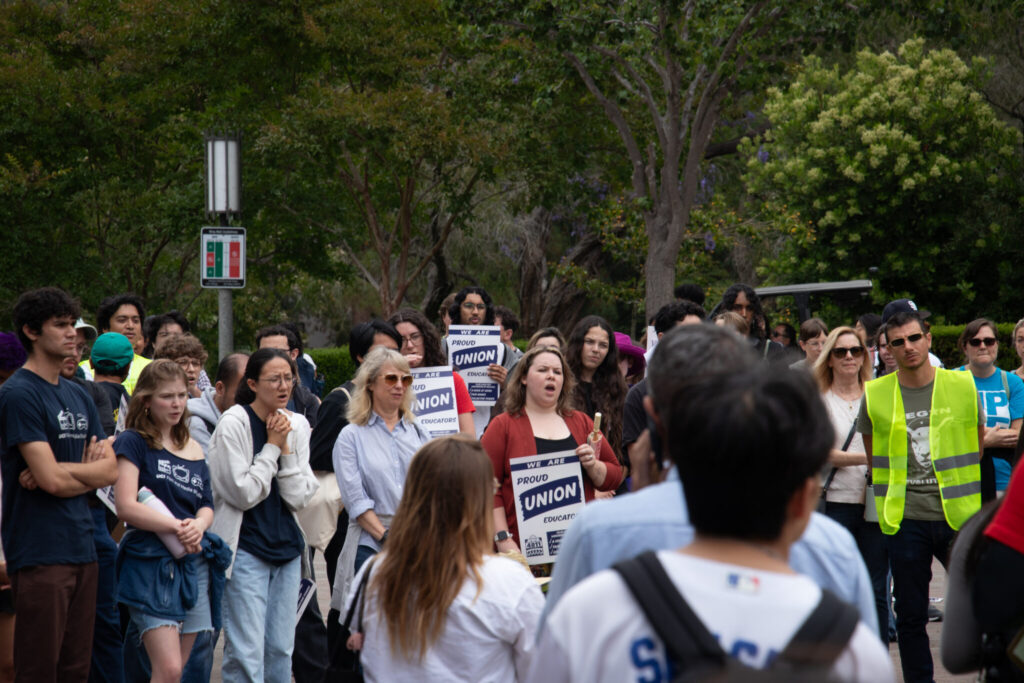 students and faculty rally at UCI