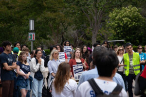 students and faculty rally at UCI